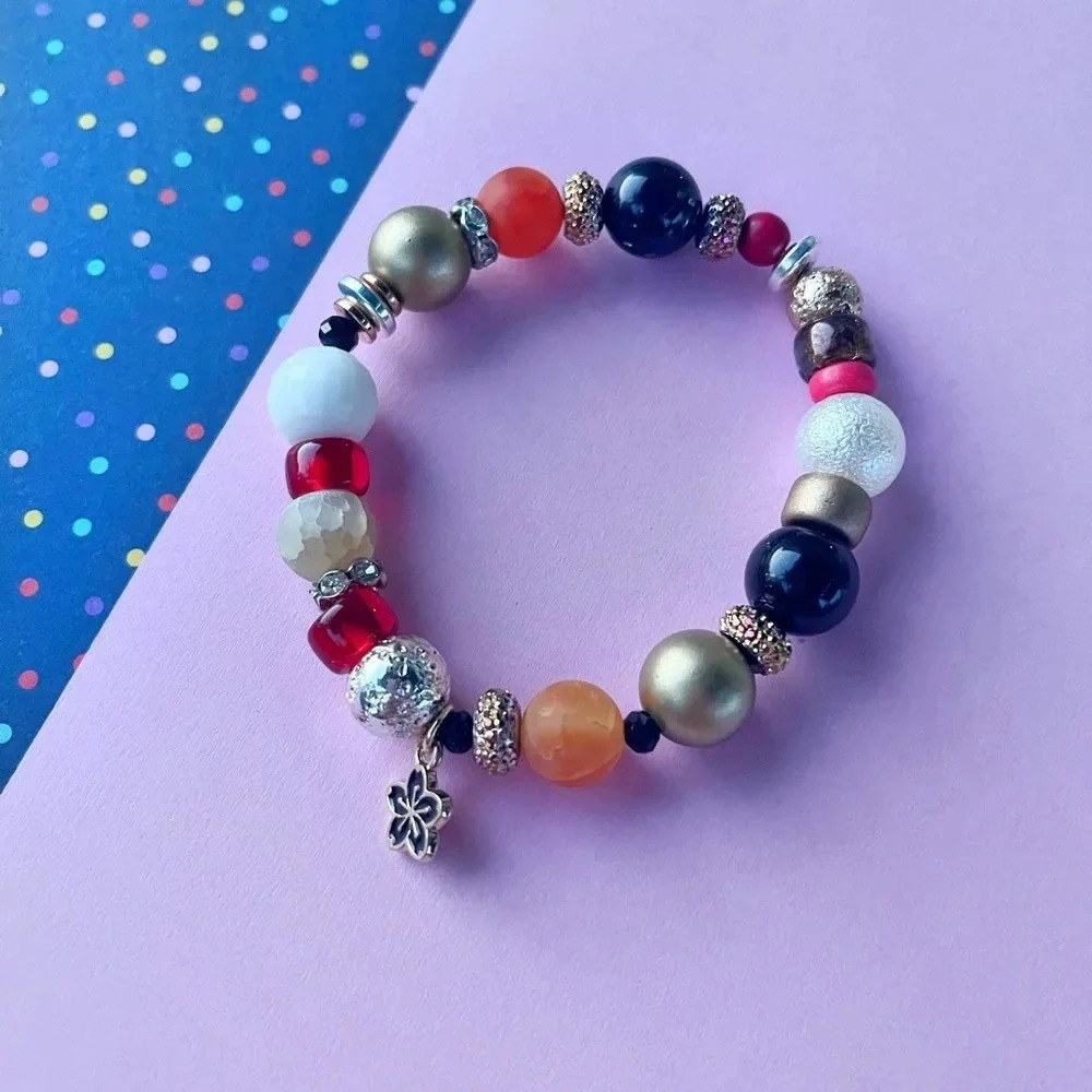 Handmade beaded statement bracelet with flower charm - Picture 4 of 4